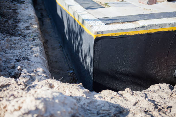 Professional Waterproofing technician working in Moline, IL